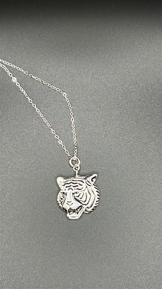 "Fierce Elegance: The Tiger's Gaze Pendant Necklace"