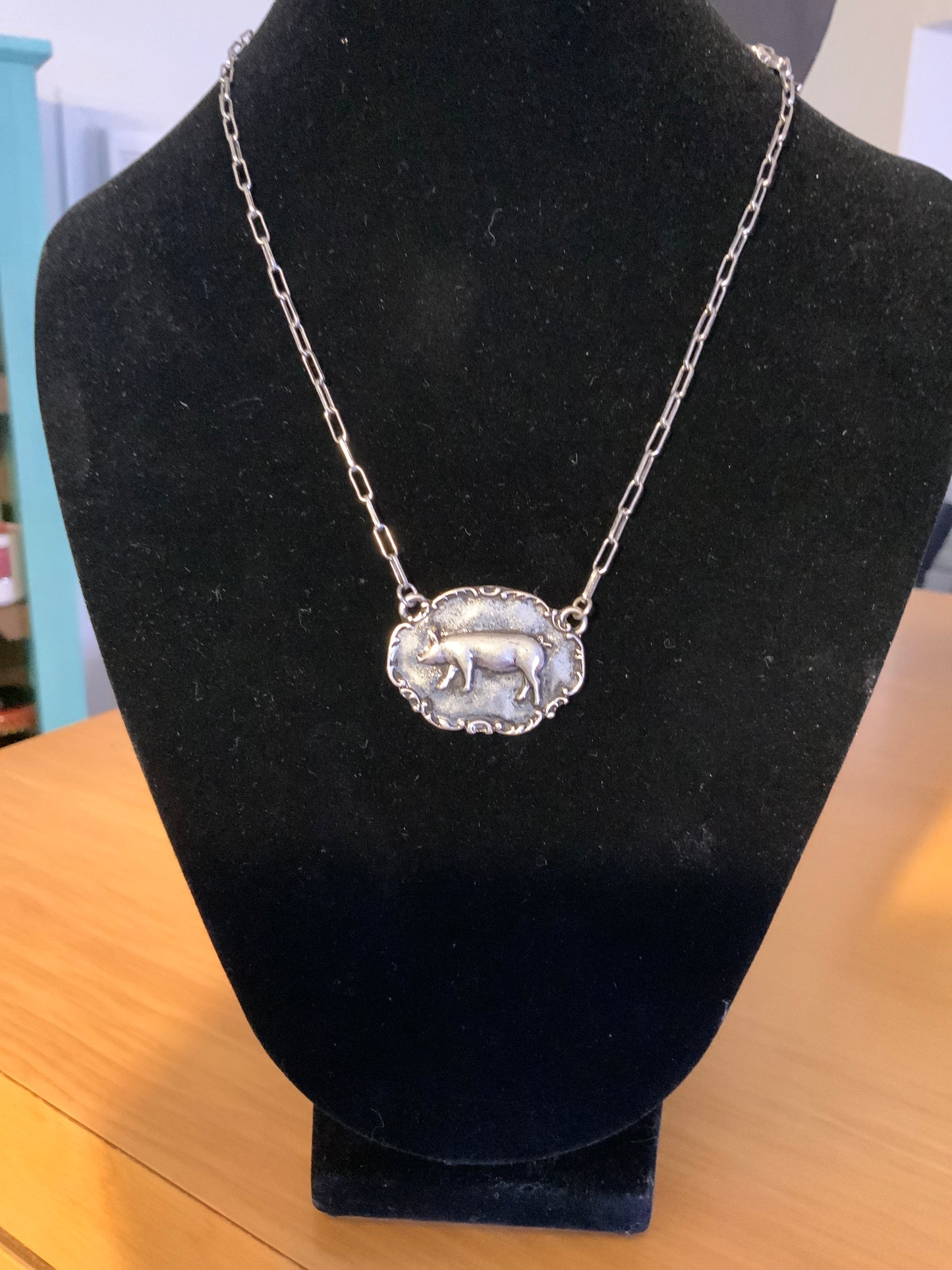 Tipi Silver-Toned Pig Buckle Pendant Necklace